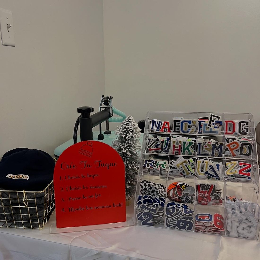 Patch station with beanies and letter patches